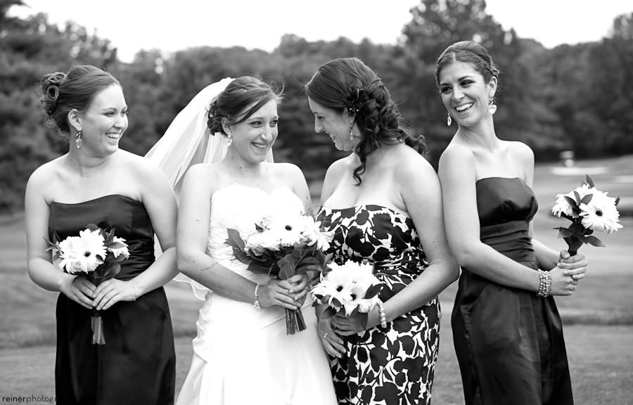 Northhampton Valley Country Club bride laughing with her bridesmaids