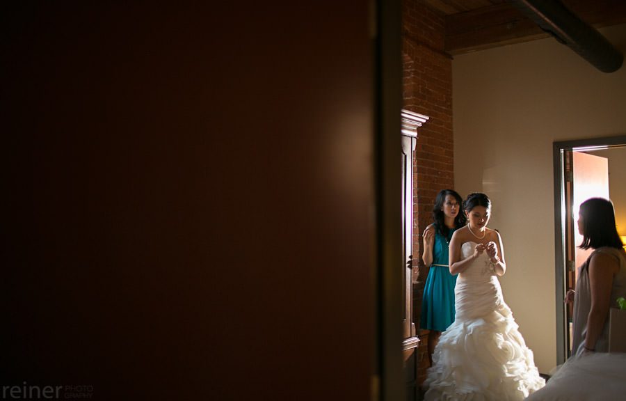 wedding photography at the Cork Factory Hotel bride getting ready for her wedding at the Cork Factory Hotel in Lancaster PA