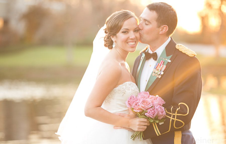 bride and groom pose for photography at Downingtown Country Club wedding reception
