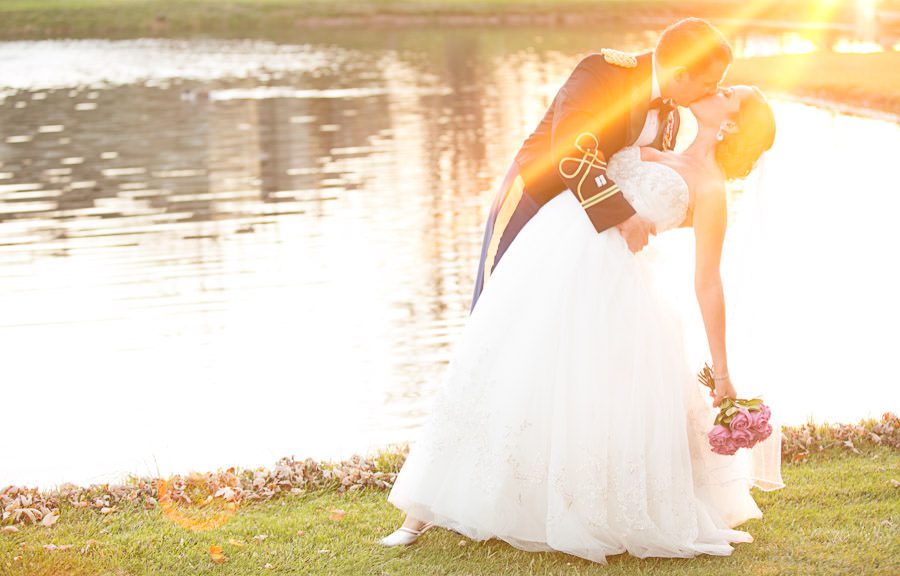 bride and groom pose for photography at Downingtown Country Club wedding reception