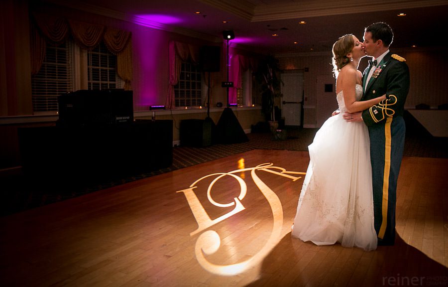 bride and groom pose for photography at Downingtown Country Club wedding reception