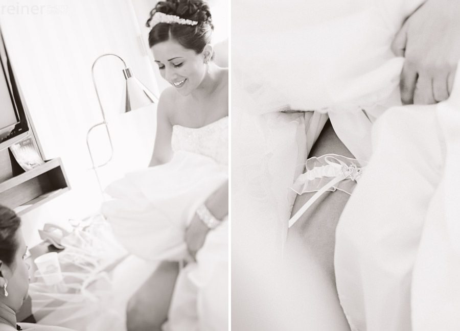 bridesmaids helping bride into her dress - Allentown PA wedding photos by Reiner Photography