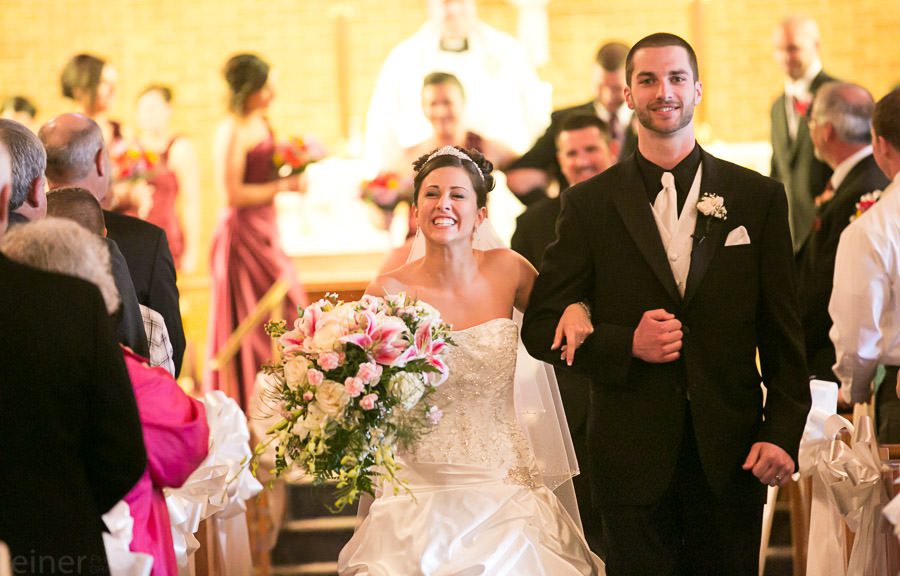 bride and groom exit the ceremony - Allentown PA wedding photos by Reiner Photography