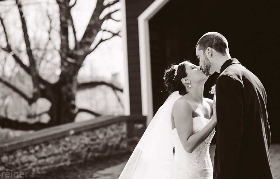 bride and her groom at Kriedersville covered bridge in Northhampton PA - Allentown PA wedding photos by Reiner Photography