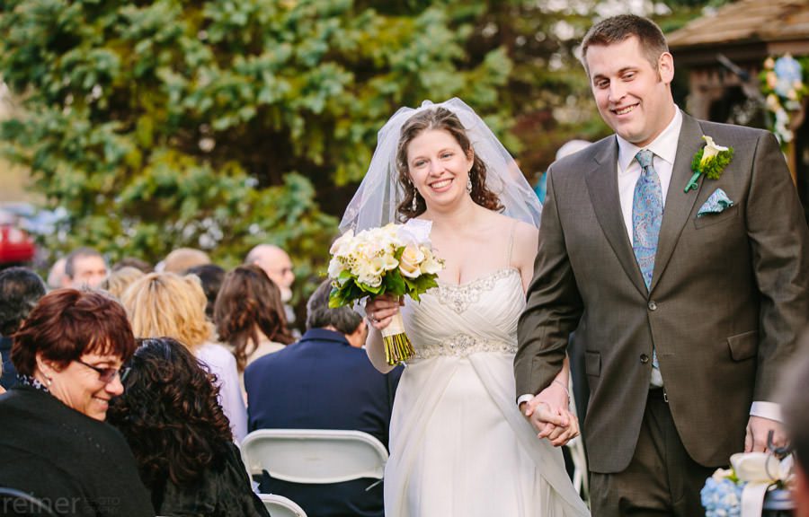 Columbia Station wedding photos - bride and groom at their ceremony by Reiner Photography