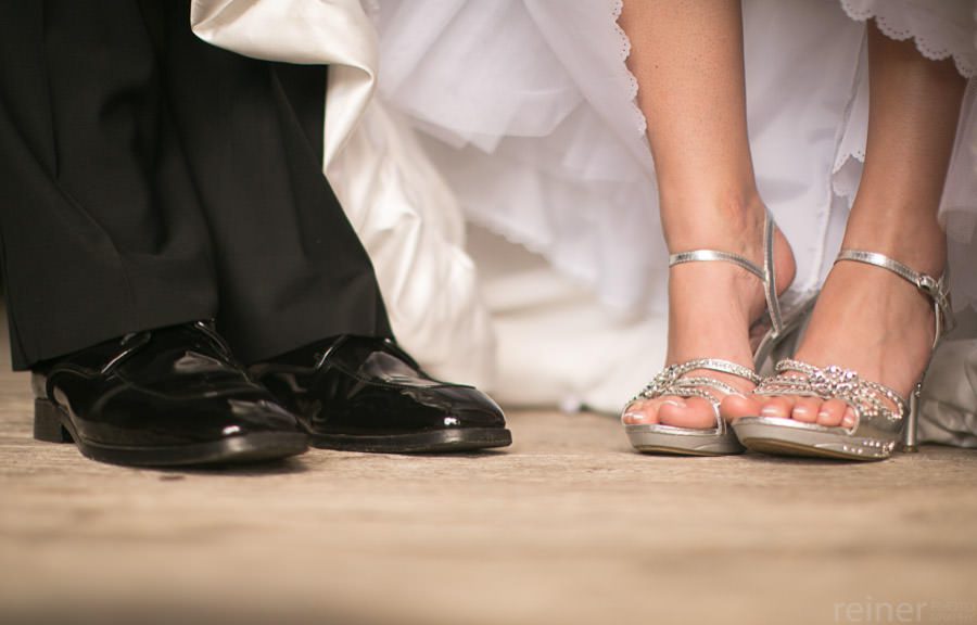 bride and her groom at Kriedersville covered bridge in Northhampton PA - Allentown PA wedding photos by Reiner Photography