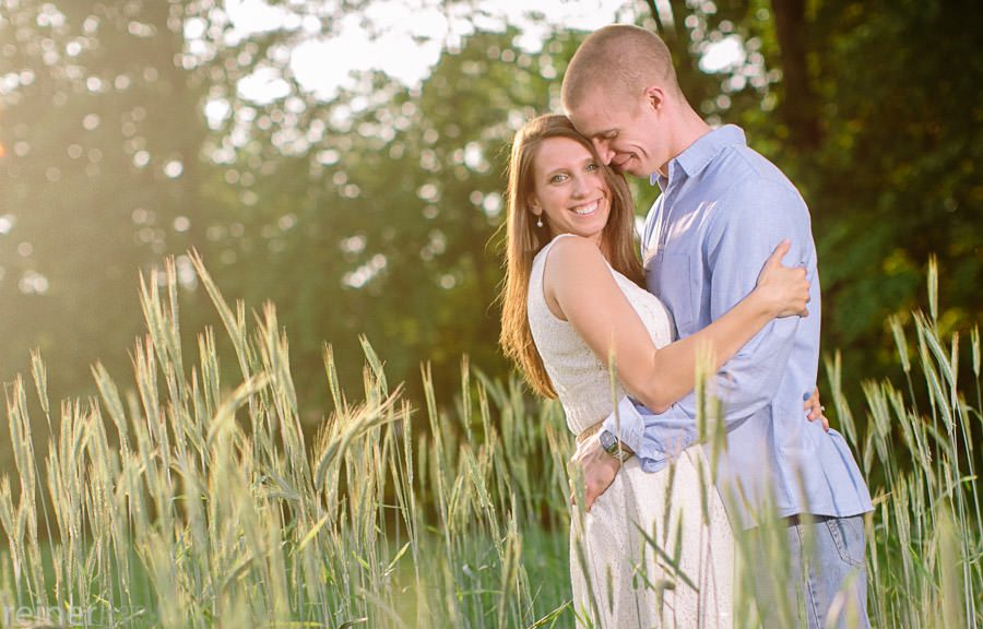 engagement session photos in a field of wheat