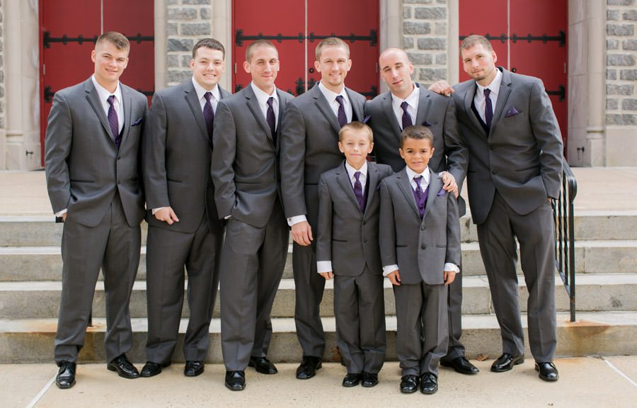 groomsmen pose for portraits before Wedding