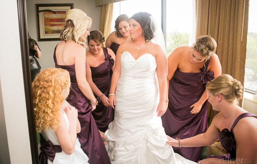 bridesmaids helping with wedding dress -Philadelphia wedding Photography - Reiner Photography