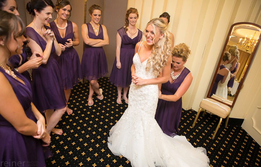 getting ready with bridesmaids before her wedding