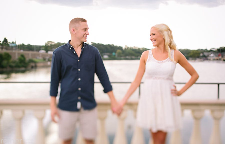 engaged couple walking near the Philadelphia Museum of Art