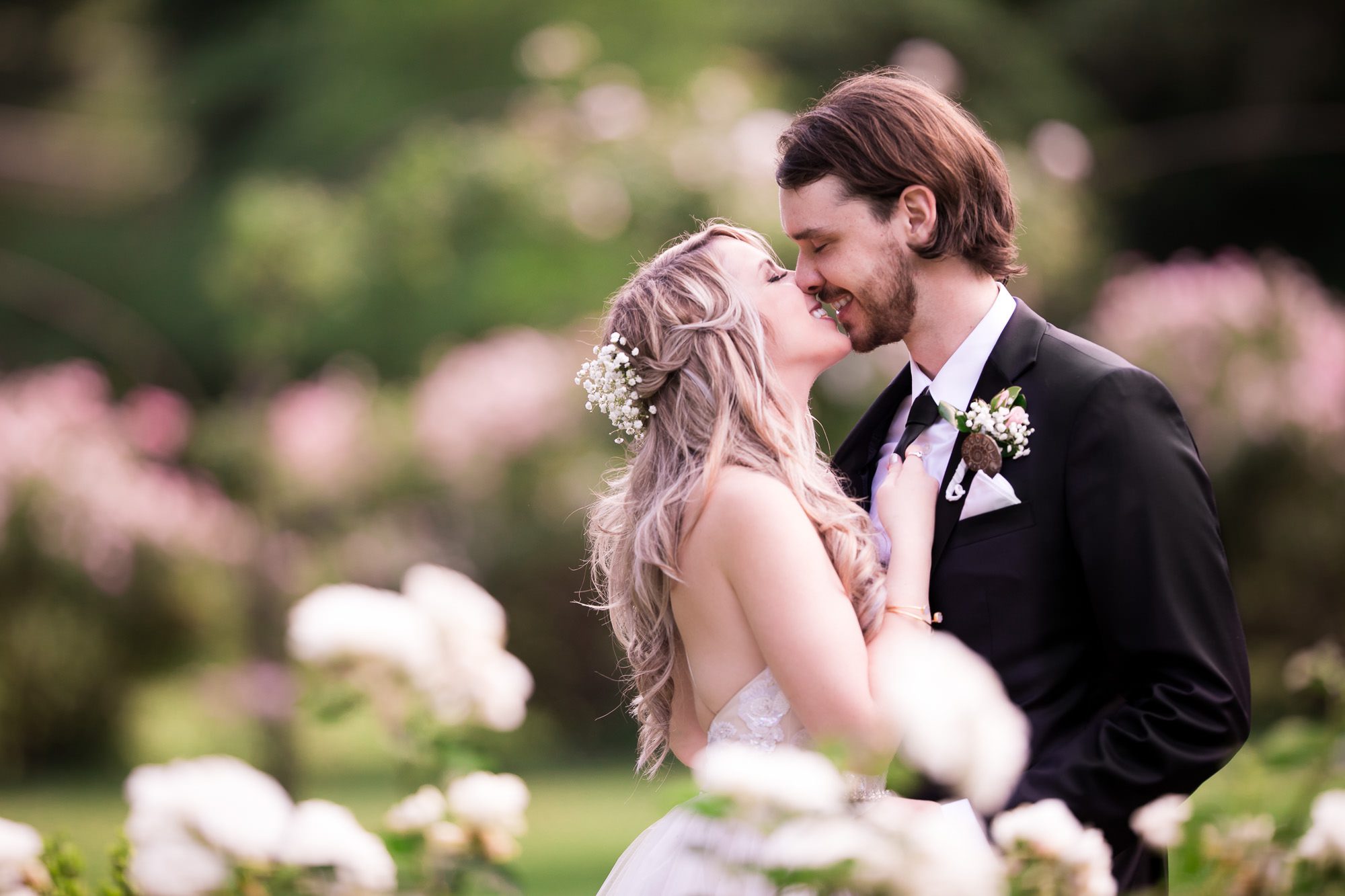 Bride and Groom kiss at Glen Foerd Wedding Portrait session with Photographers