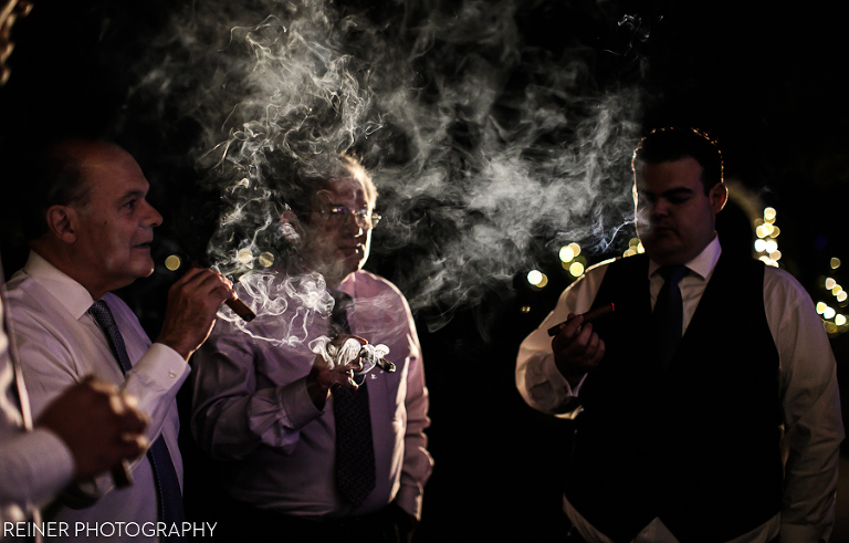 groomsmen smoking cigars