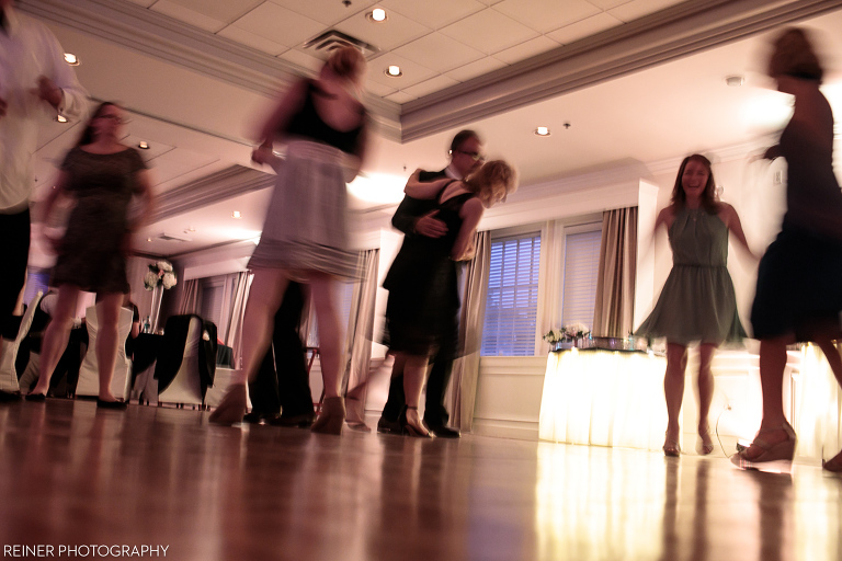 motion blur photo of wedding guests dancing