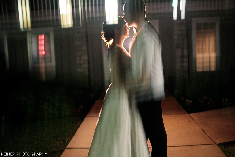 night time portrait of bride and groom
